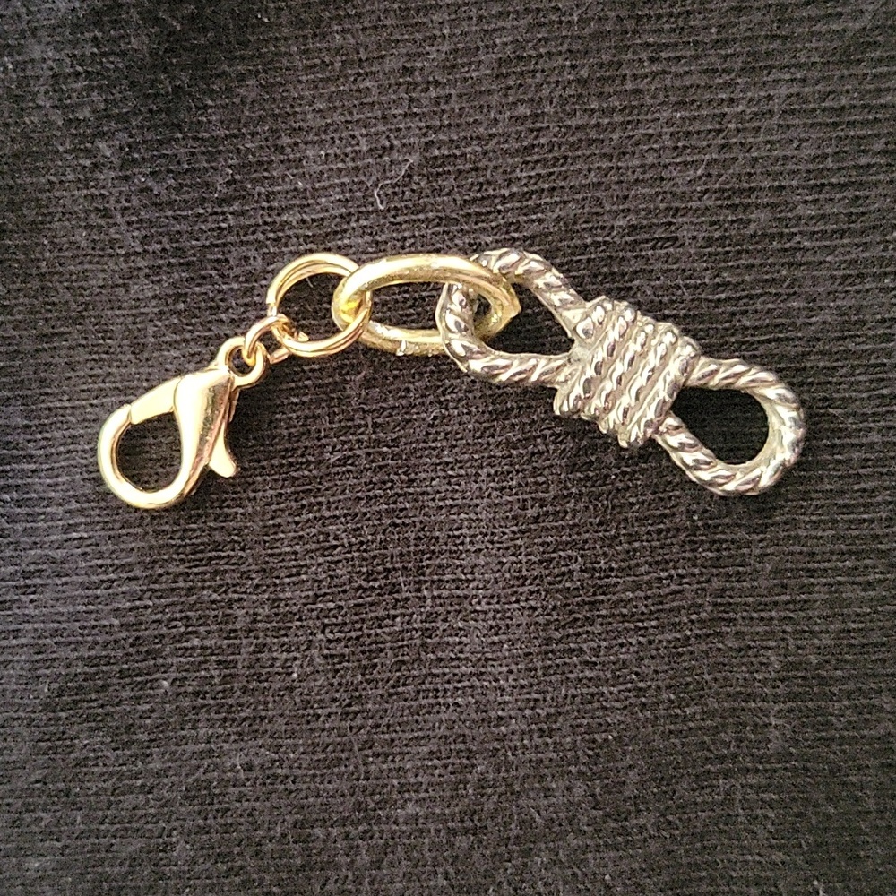 Silver and goldtone rope charm